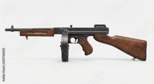 Vintage submachine gun with wooden grip and metal components