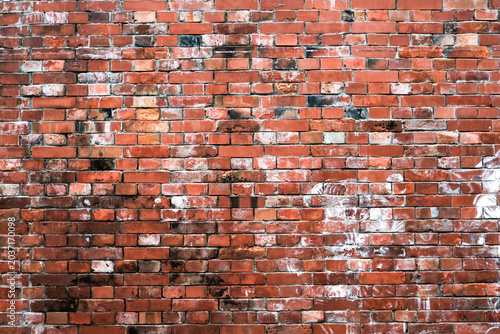 old brick worn wall ancient, red brick masonry surface.