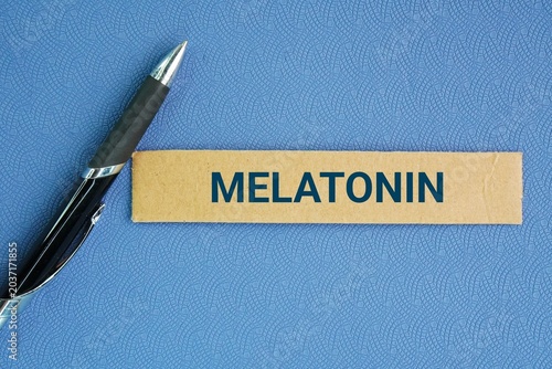 Фотография Pen and paper box with the word Melatonin