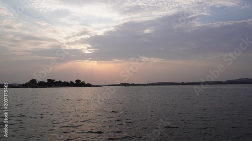 Evening reservoir panorama with calm water and clouds video