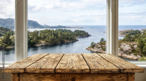 Wooden table mockup with scenic lake and mountain background