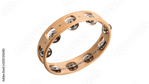 Photos Traditional musical percussion wooden tambourine with metal jingles isolated on