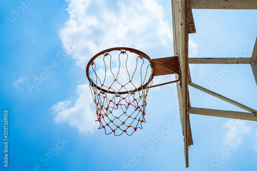 basketball hoop against blue sky