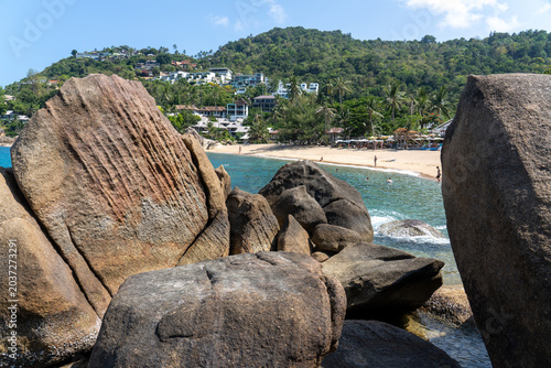 Beautiful tropical island with giant granite rock formations on the beach, crystal clear turquoise water