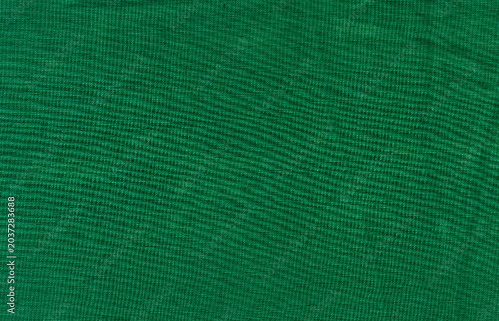 Fototapeta premium Green fabric texture background with fine textile pattern and smooth surface. Minimal modern backdrop for creative designs.