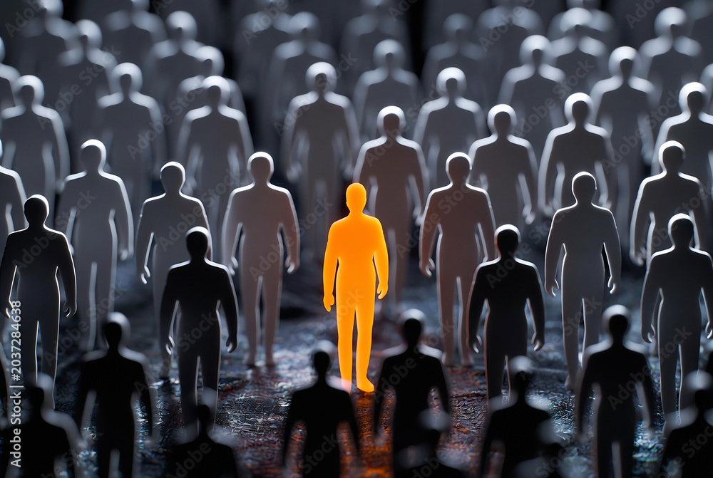 Fototapeta premium A single bright orange silhouette stands in the center of a crowd of dark, shadowy figures.
