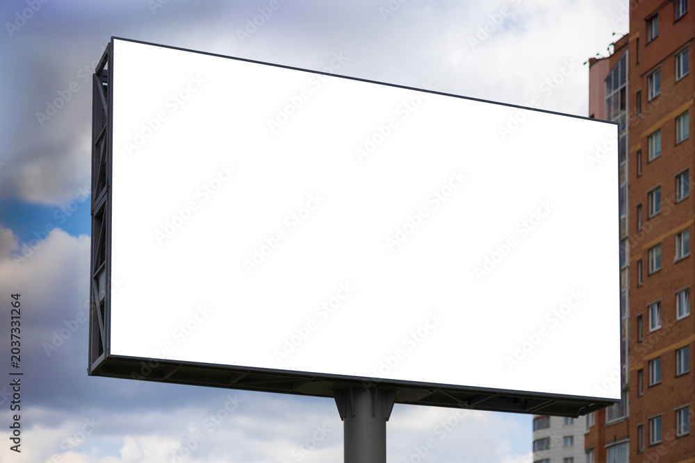 Fototapeta premium Advertising billboard along the road in the city. Background for design. 