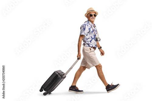 Tourist with a suitcase walking