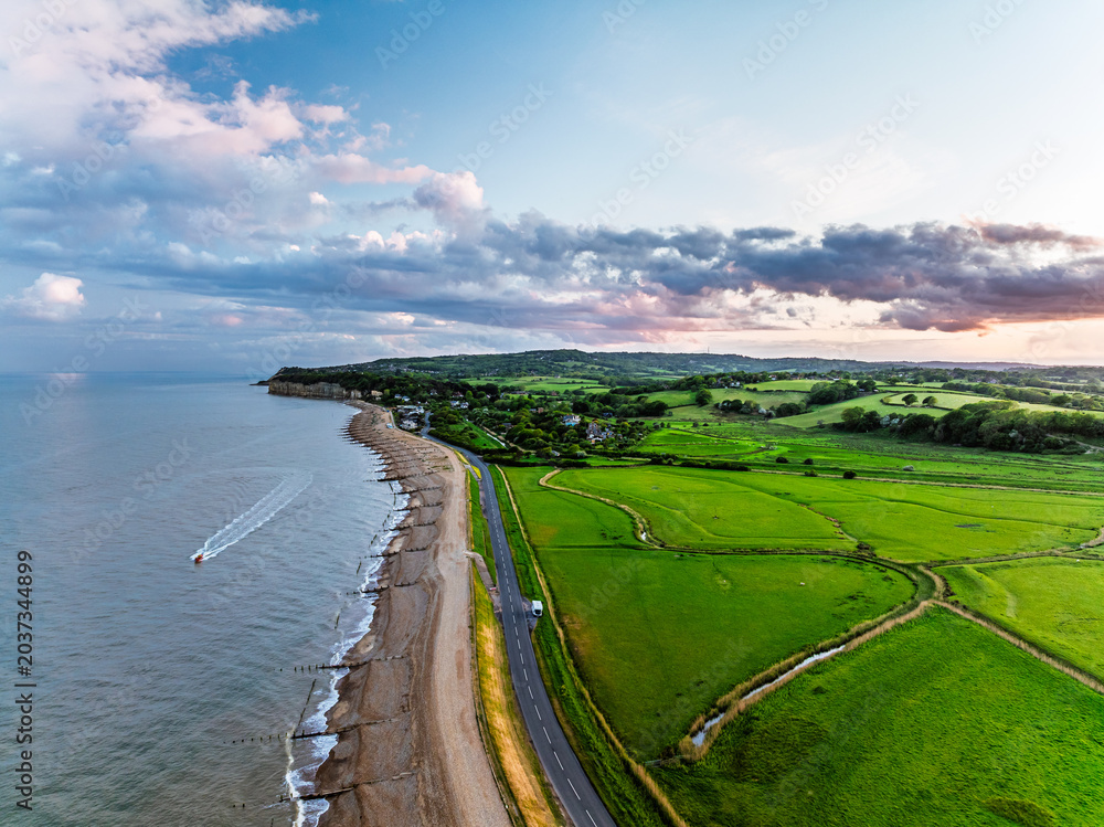 Obraz premium Marshes over Beach Rye Bay from a drone, Rye, East Sussex, England