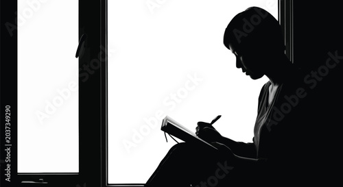 Quadro su tela Contemplative young woman writing in journal by window with natural light, silho