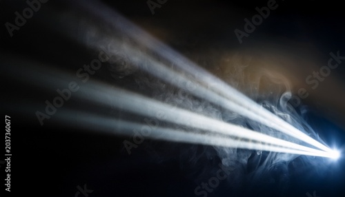 Dramatic Lighting Beam Shining Through Atmospheric Smoke Against Dark Background