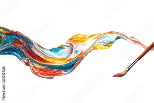 Paintbrush dripping colorful paint onto white paper creating art