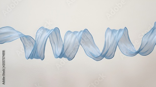 Flowing Blue Ribbon Spiral on Light Background