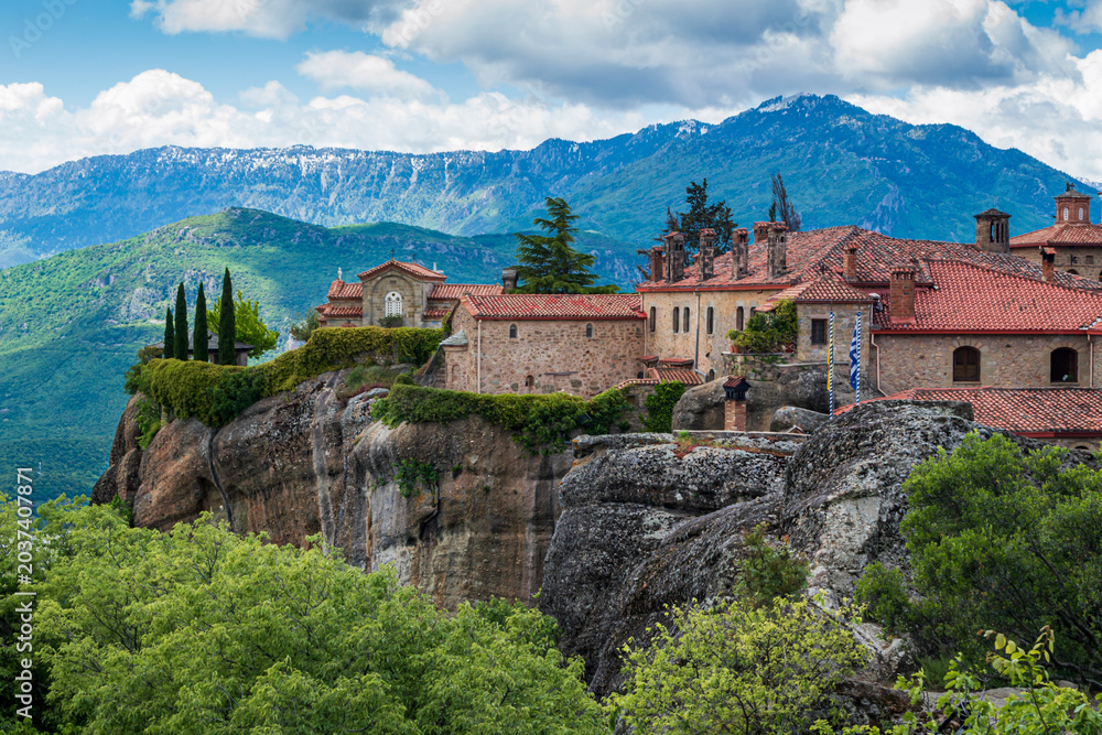 Fototapeta premium Meteora Monastery on Rocky Cliffs with Mountain Landscape in Greece 