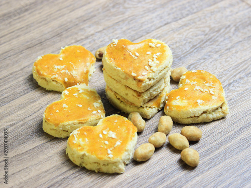 Konstfotografi Close up of peanut cookies with sesame seeds topping that shape of the heart, sw