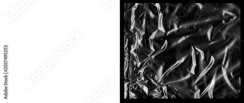 Tableau sur toile Crumpled black plastic texture background, wrinkled dark synthetic material with