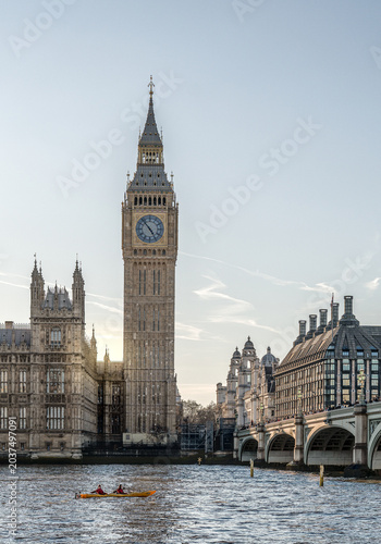 Фотография Iconic Big Ben Elizabeth Tower and Westminster Bridge over River Thames with peo