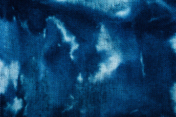 Macro view of blue tie dye fabric texture
