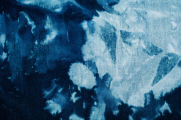 Macro view of blue tie dye fabric texture