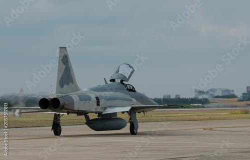 Fighter plane on abstract technology background
