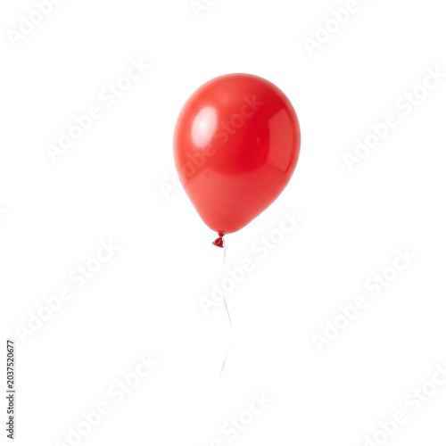 Red balloon with string, isolated