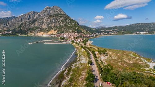Bild auf Leinwand drone panorama of the inhabited Lake Egirdir peninsula showing coastal houses and small harbors