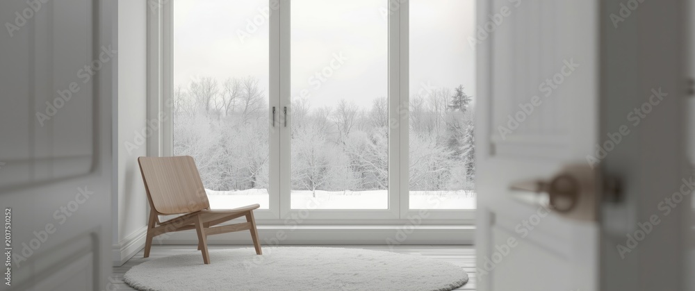 Fototapeta premium Clean white living area decorated in Scandinavian style with chair beside a window displaying winter outdoors