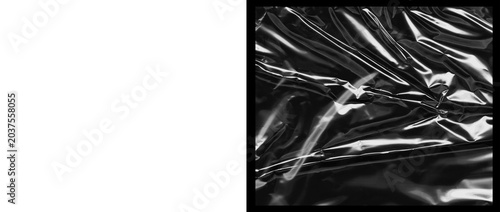 Photos Crumpled black plastic texture, glossy wrinkled cellophane wrap background, shin