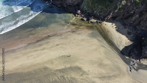 piha black sand beach drone