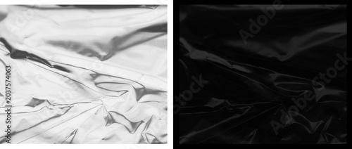 Tableau sur toile Glossy black plastic texture with wrinkled surface, dark metallic foil backgroun