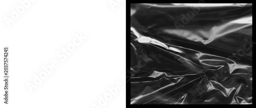 Bild auf Leinwand Crumpled black plastic texture, wrinkled dark polyethylene film background, shin