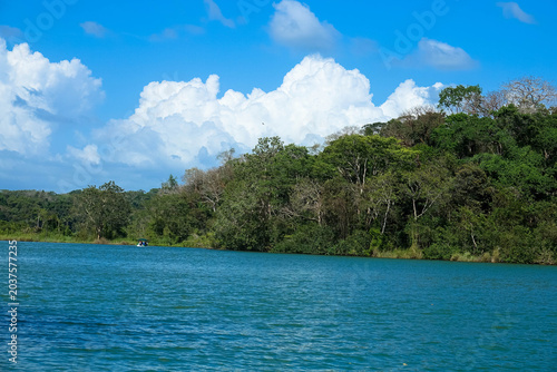 Gatun Lake is an artificial lake in Panama, traversed by the navigable link connecting the Atlantic and Pacific Oceans. It serves primarily as a freshwater reservoir. 
