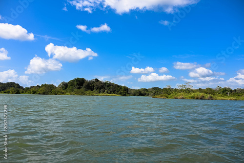 Gatun Lake is an artificial lake in Panama, traversed by the navigable link connecting the Atlantic and Pacific Oceans. It serves primarily as a freshwater reservoir. 