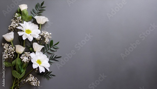 minimalist sympathy condolences card flowers on a muted grey background funeral concept copy space