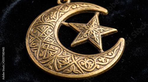 Crescent moon star ornament with intricate designs, symbolizing beauty and elegance
