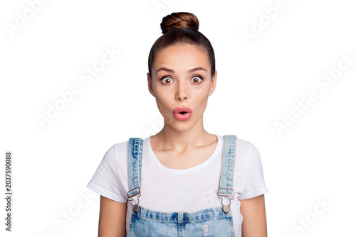 Schilderij op canvas Portrait of impressed lady looking with opened mouth wearing white t-shirt denim