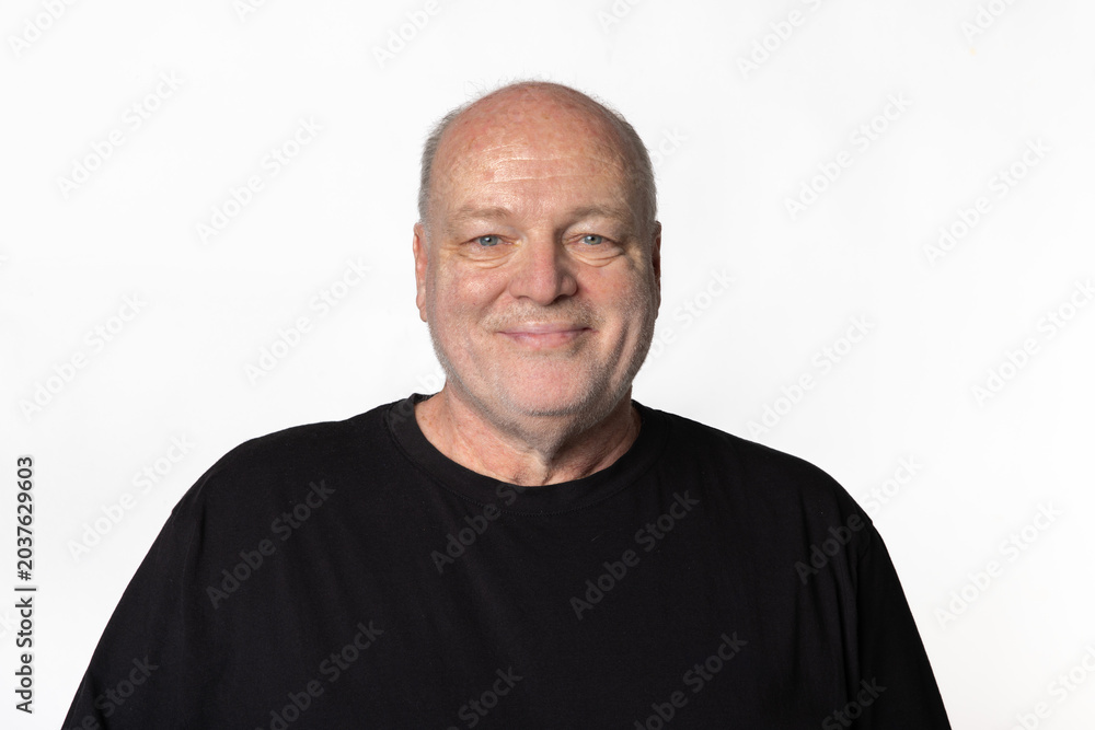Fototapeta premium Smiling 60 Year Old Man Portrait Isolated on White Background