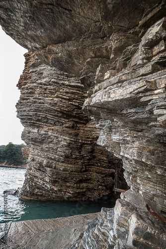 Cliff on the shore of the Adriatic Sea. Rocks in close-up