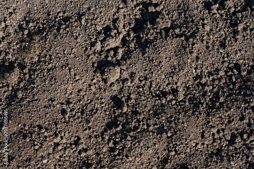 фотографія Close-Up View of Rich, Dark Soil with Textured Surface Ideal for Gardening and A