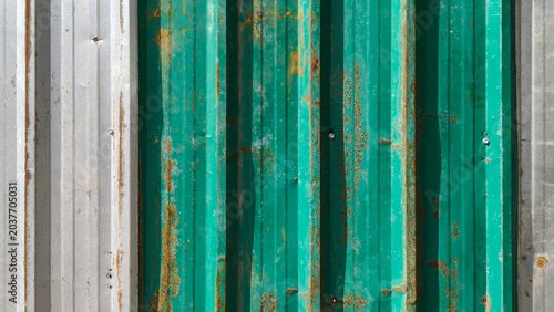 Fotografija old Galvanized sheet with scratch and dented and dirty rusted screws