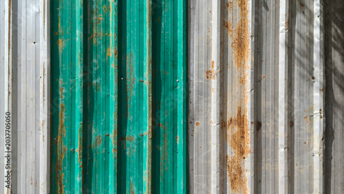 Fotografija old Galvanized sheet with scratch and dented and dirty rusted screws