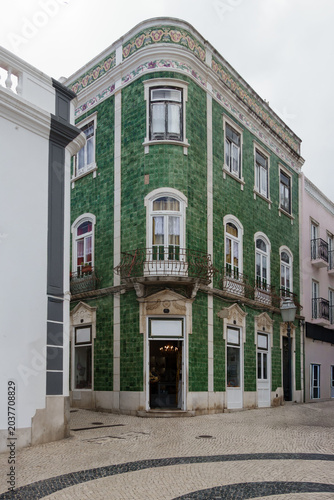 Green tiled traditional building in Lagos in Portugal