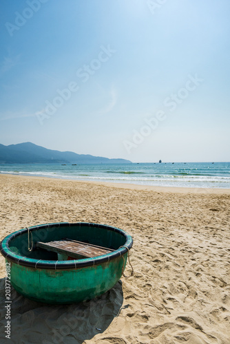 Da Nang beach landscape with coconut basket boat at My Khe beach area, Vietnam. Beautiful beach of Da Nang, Vietnam