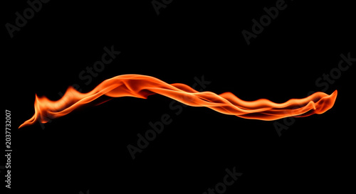 Fiery orange flame ribbon isolated on black background dramatic fire element for design