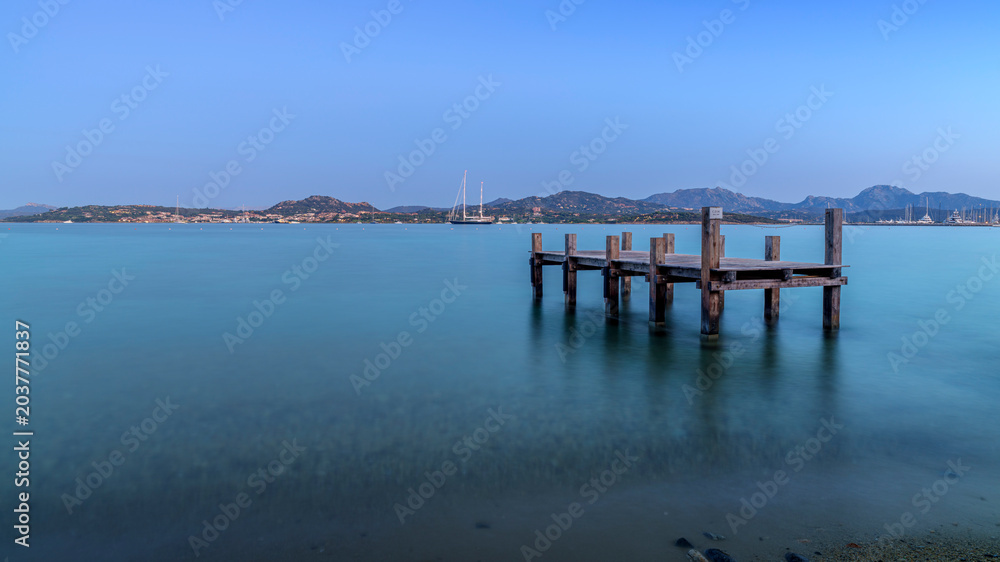 Fototapeta premium A picture of jetty at sunset