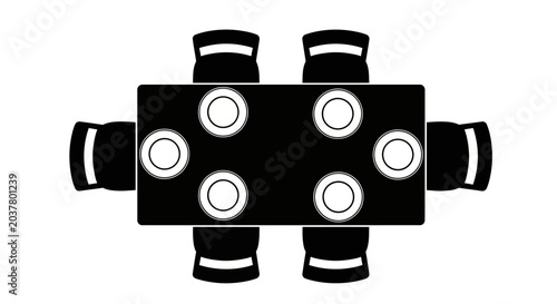Top view of a black dining table with six white plates and chairs