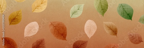 Golden Autumn Leaves on Textured Glitter Background