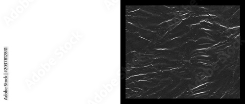 Foto Crumpled black plastic texture, wrinkled dark polyethylene film surface, macro s