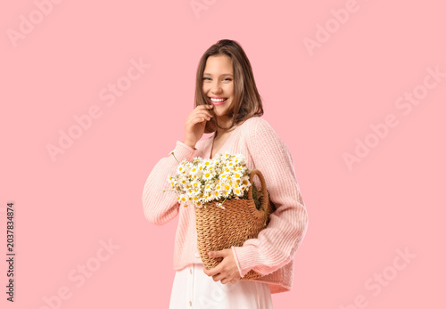 Happy young woman with wick...