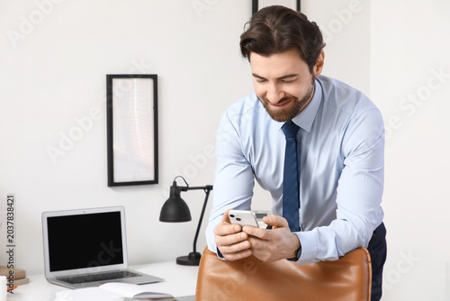 Handsome businessman workin...